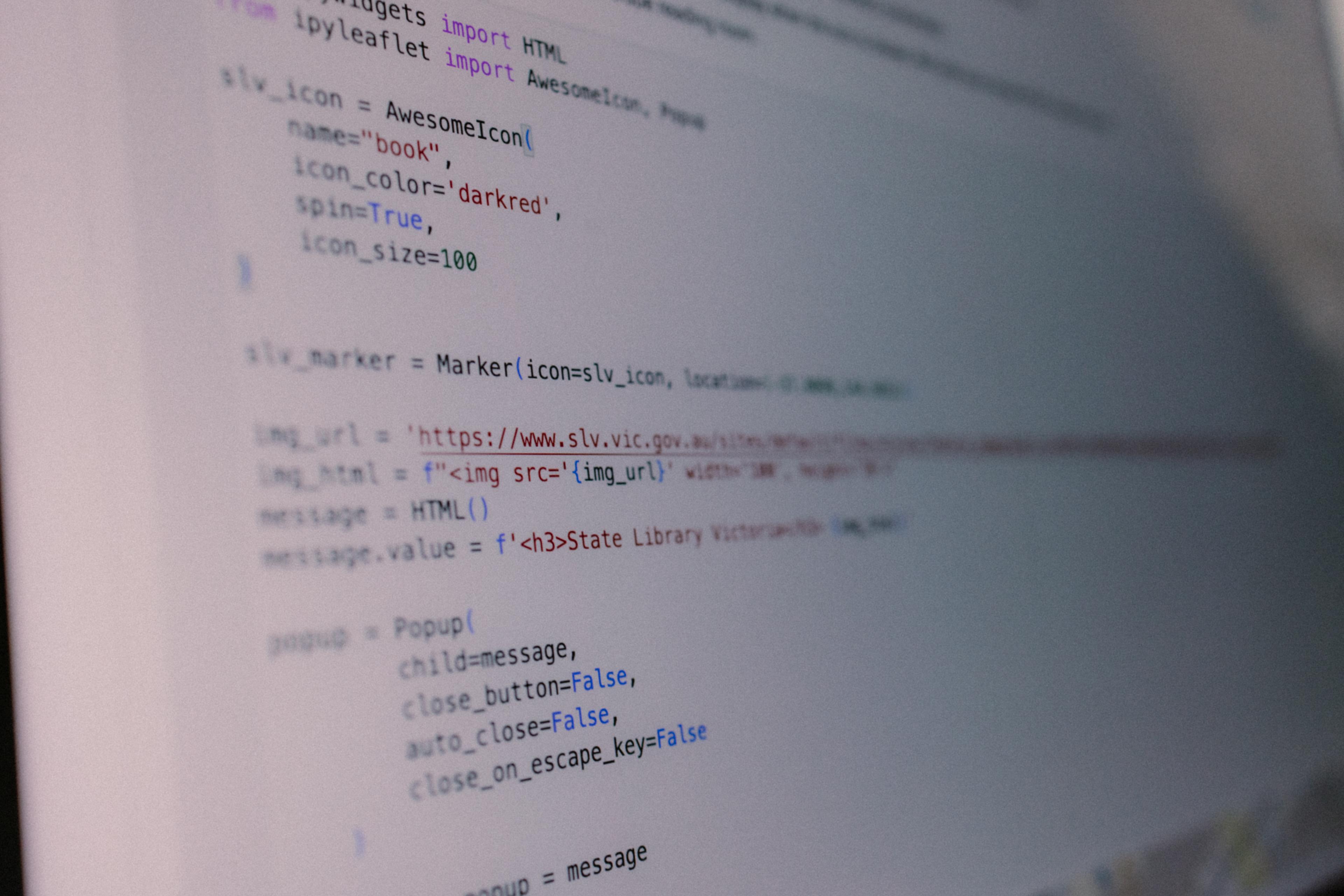 A close-up picture of multicoloured code written in Python on a screen.