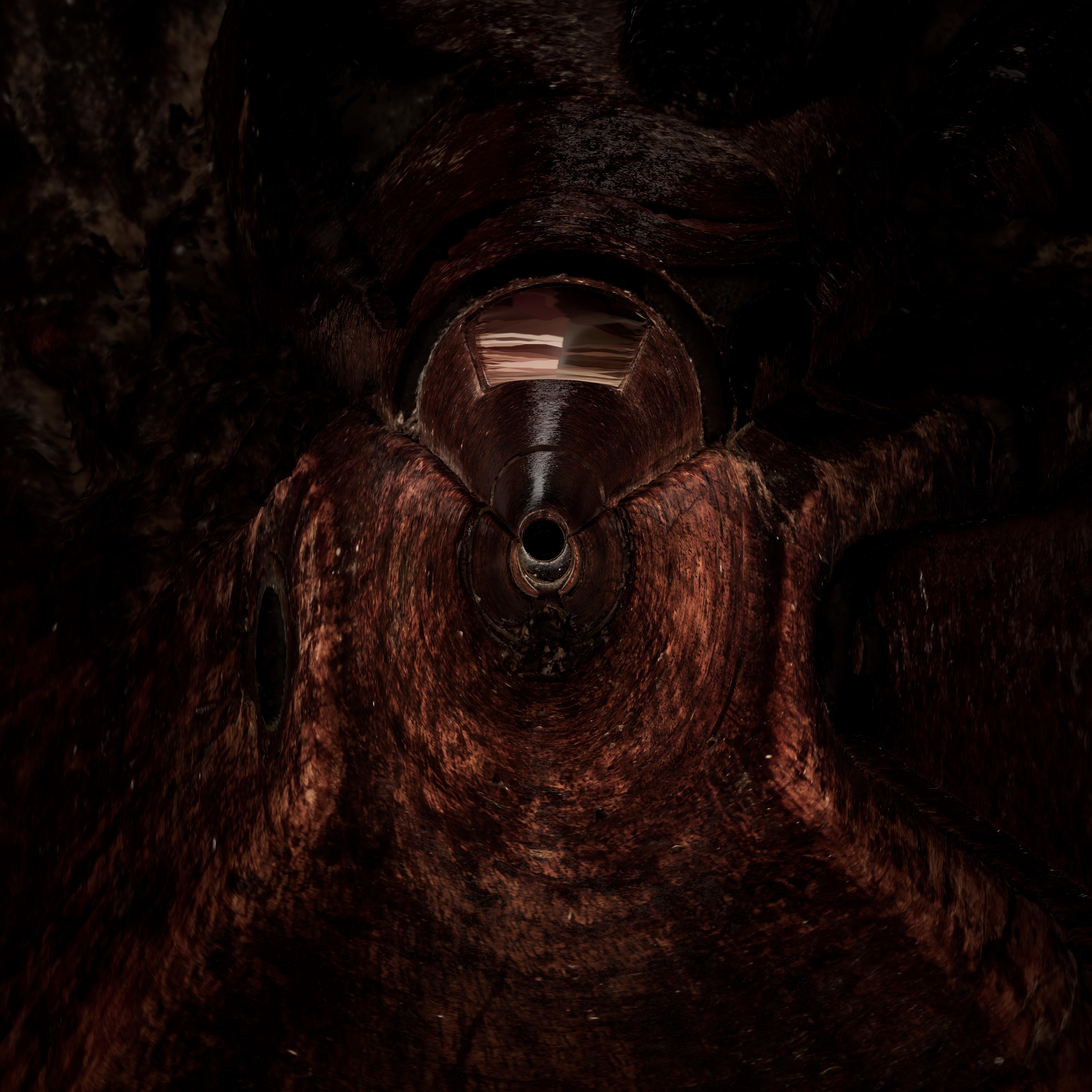 Digital render of the inside of a rusty-looking rifle barrel.