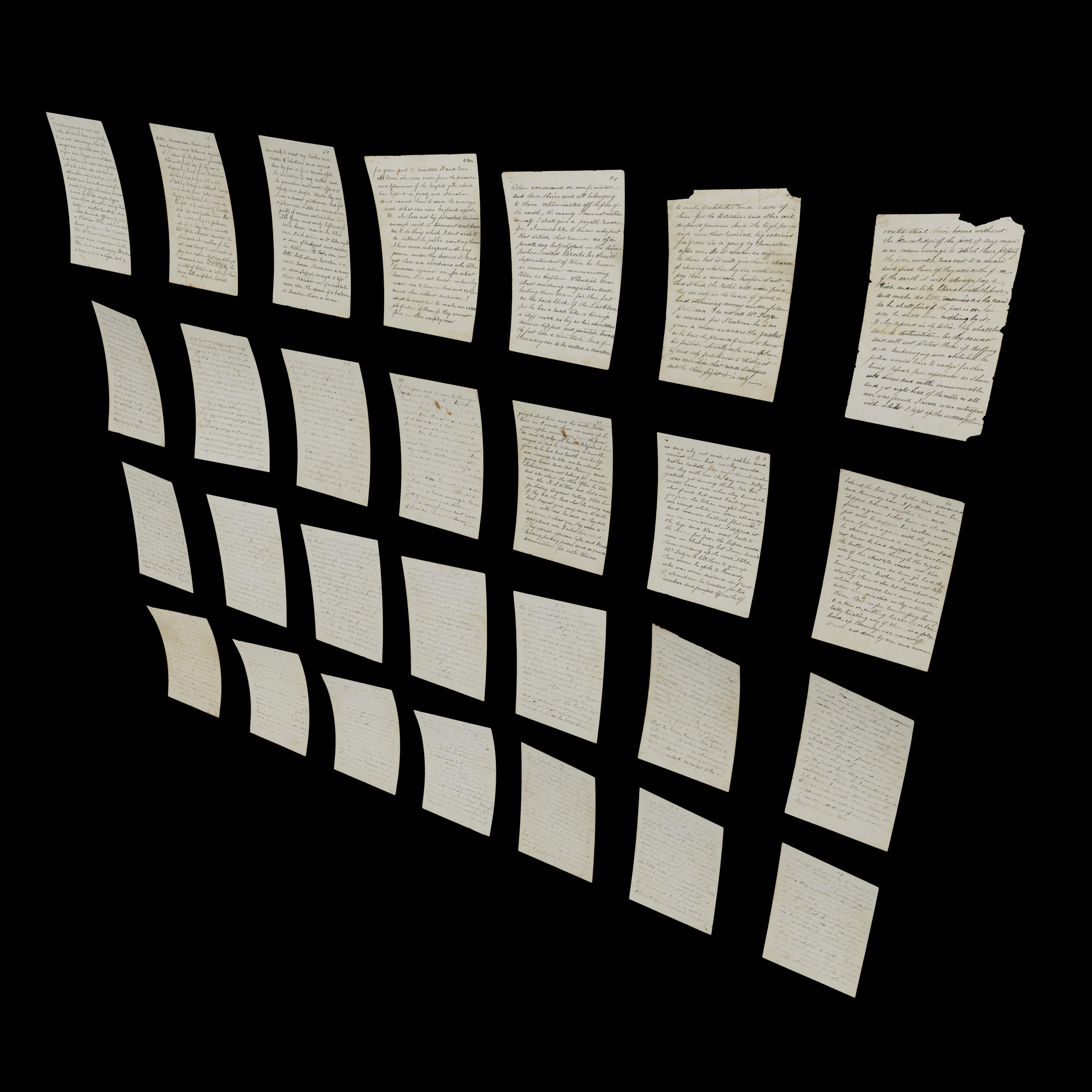 Digitised letters arranged in a 7x4 grid on a blank black background, slightly askew from camera.