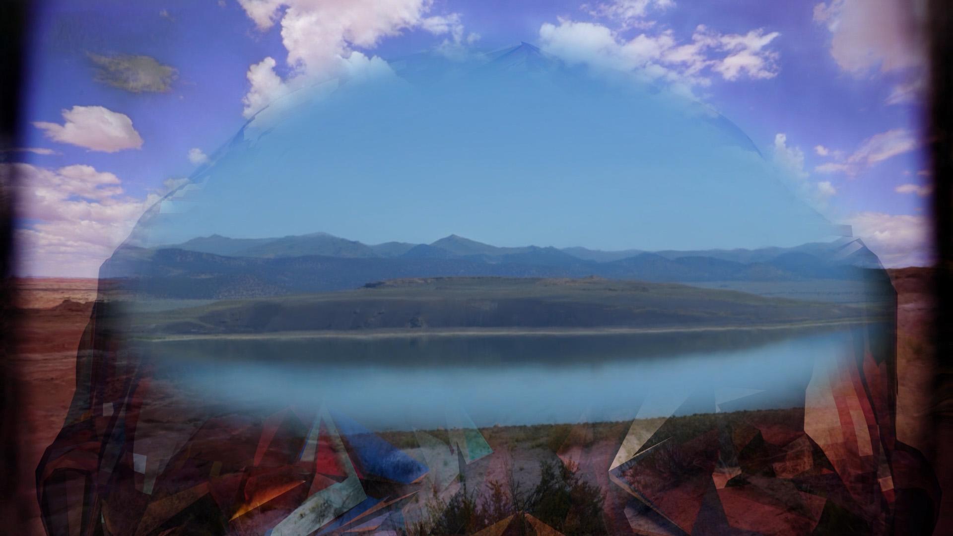 A dream-like artwork depicting a portal showing a mountain range and lake. This is superimposed over a multi-coloured distortion over a blue sky, white cloud and desert backdrop. 
